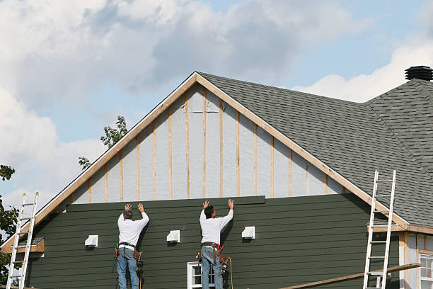 Professional Siding Replacement technician working in Larkspur, CO
